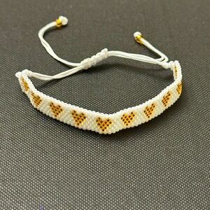 White and gold heart micro-bead bracelet